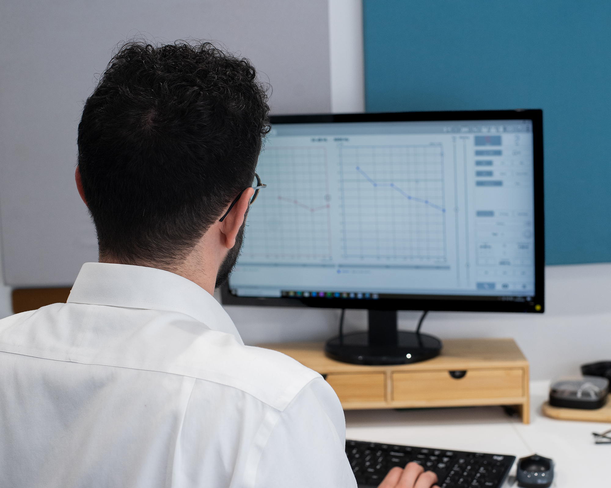Audiogram Audiologist looking at an audiogram showing hearing loss